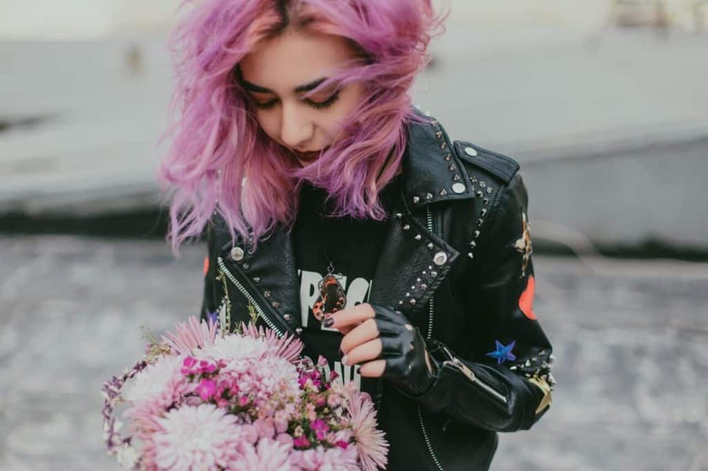 girl wearing leather jacket dolls kill