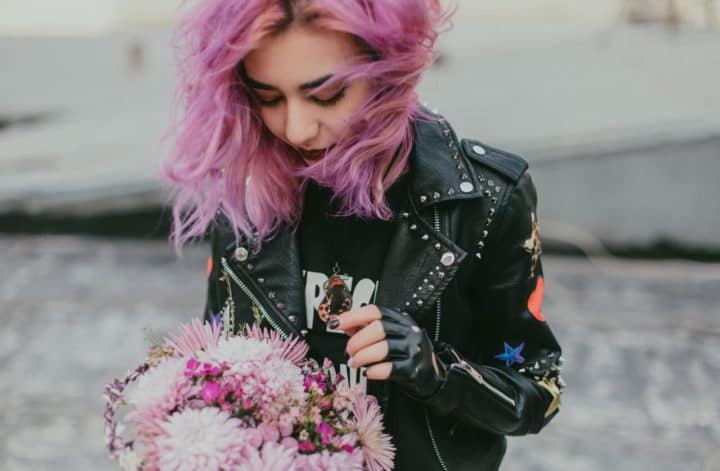girl wearing leather jacket dolls kill