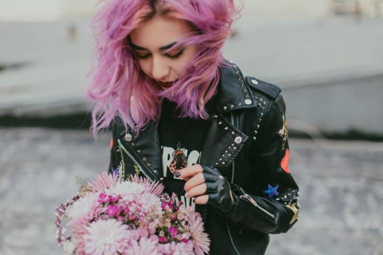 girl wearing leather jacket dolls kill