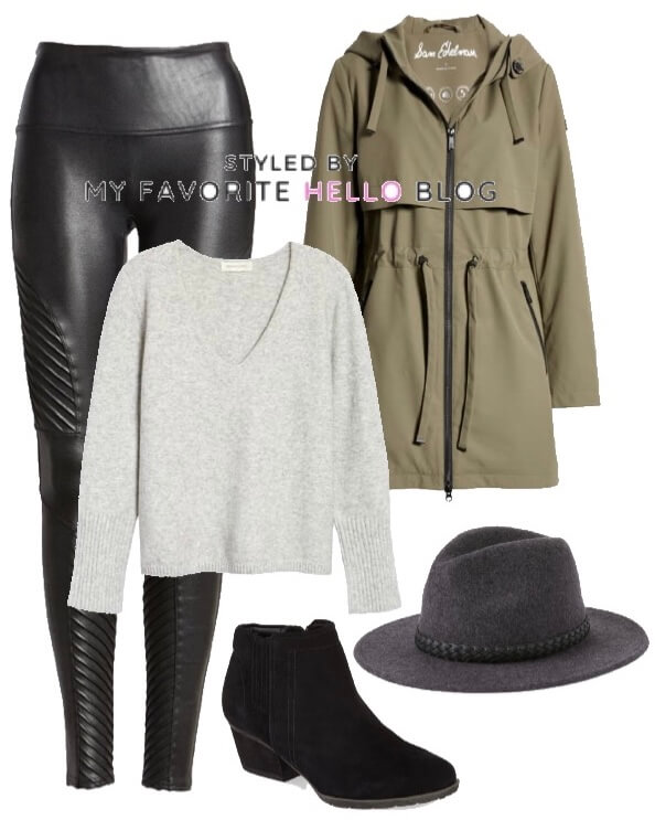 Black faux leather leggings and olive raincoat and wool hat