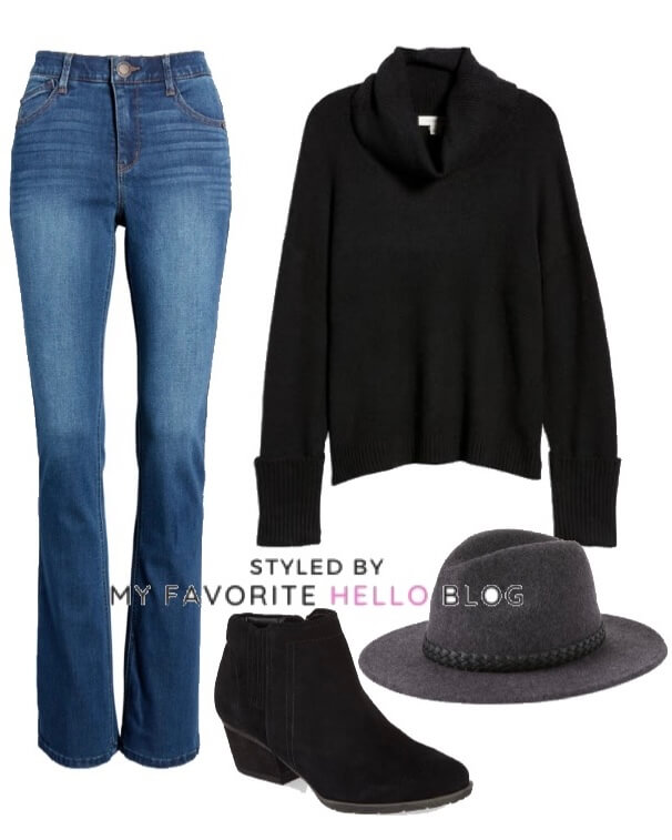 winter outfit blue jeans with black sweater and wool hat