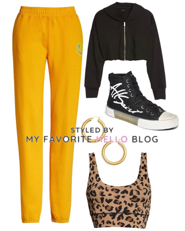 Yellow sweatpants with leopard sports bra and cropped black hoodie