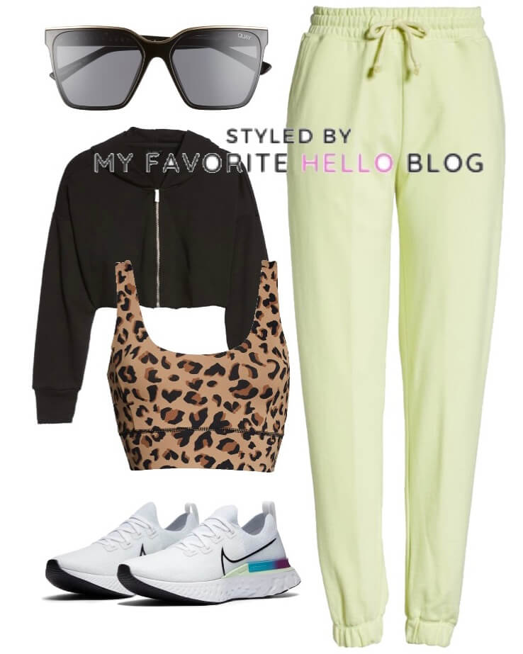 Yellow sweatpants outfit with black hoodie and white sneakers