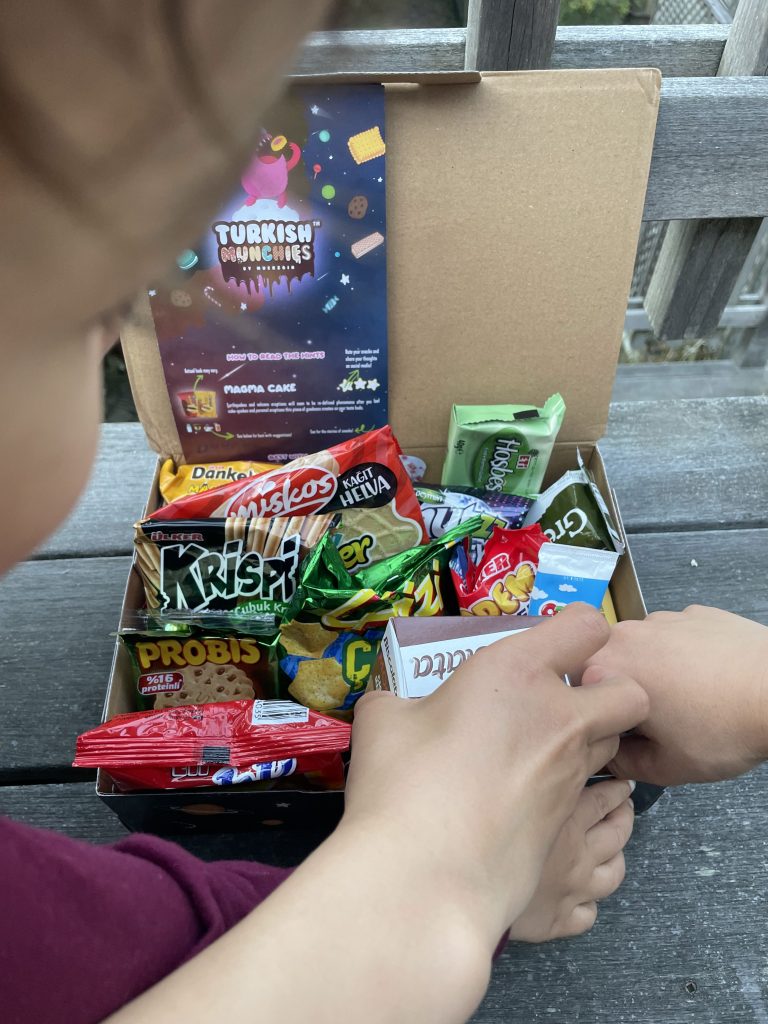 Kids eating Turkish Munchies Snack box